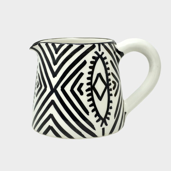 Blue Milk Jug Eye Design by Artisan Stories