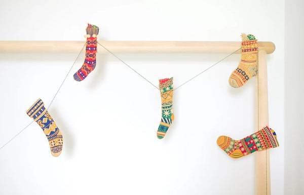 Festive Stockings Screenprinted Paper Garland by East End Press