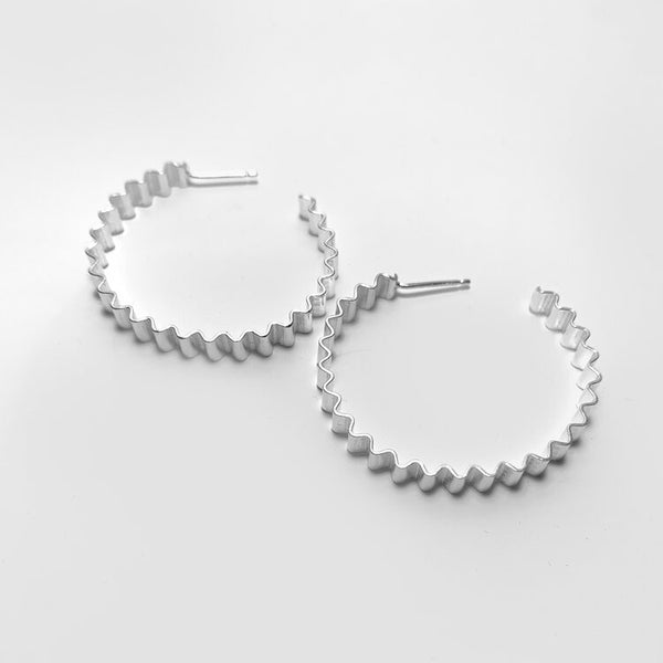 Olivia Taylor - Large Ondulee Hoops - Silver